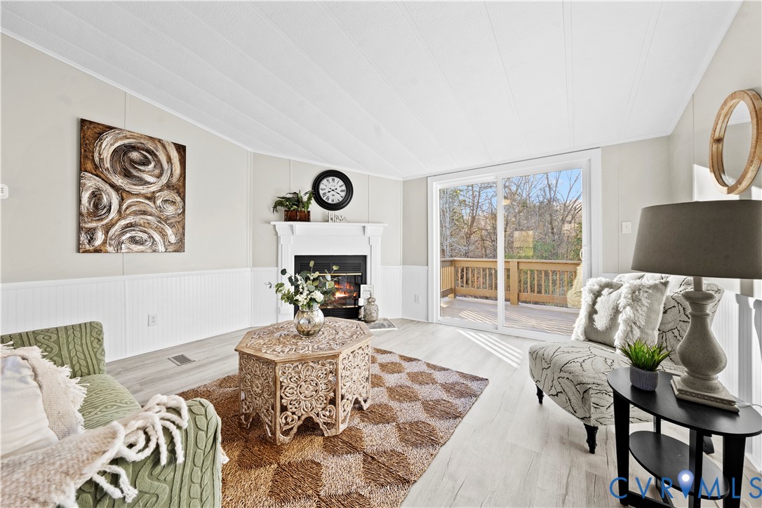 4621 Meherrin Road Meherrin, VA 23954 - Photo 10 of 49 a living room with furniture and a large window