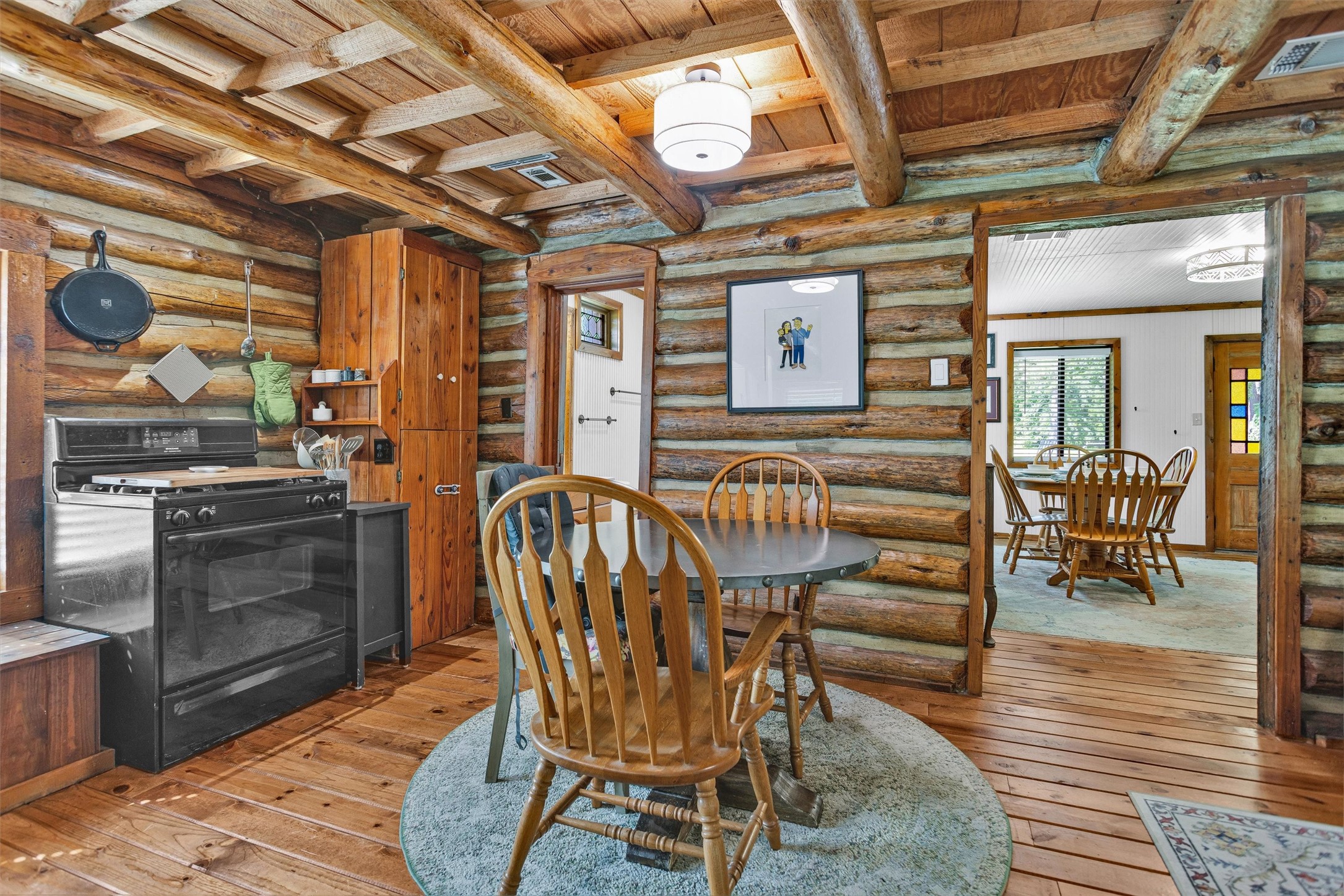 1356 Pegoda Ranch Road Groveton, TX 75845 - Photo 18 of 44 a view of a dining room with furniture