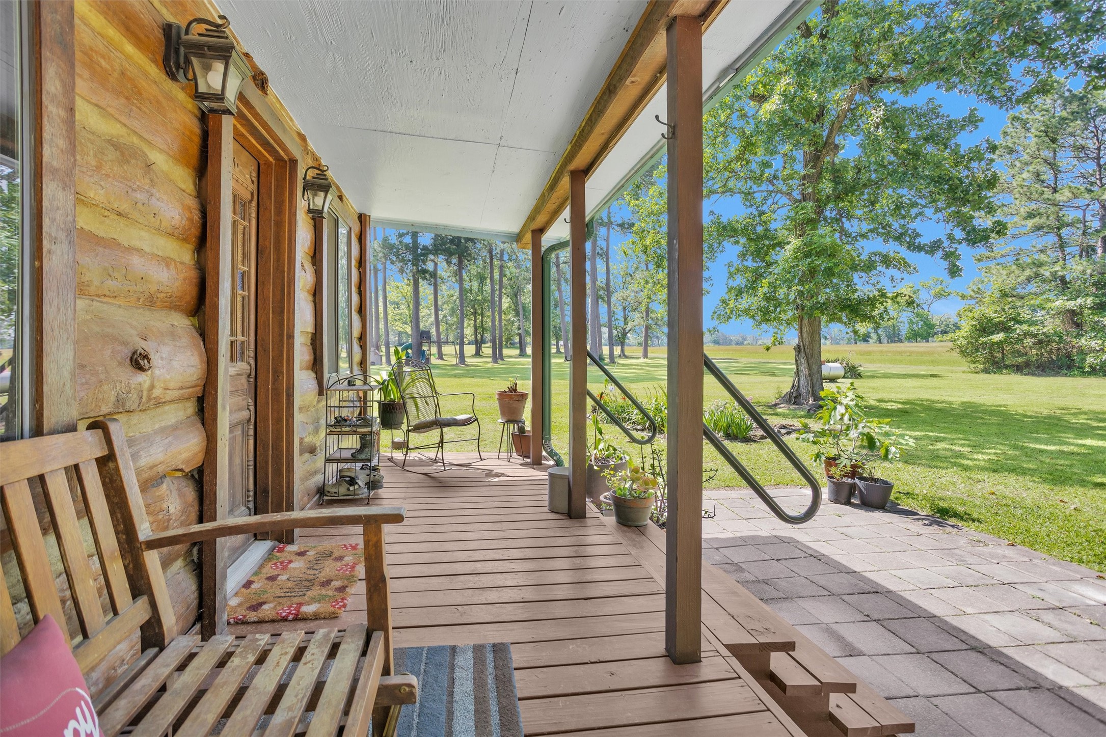 1356 Pegoda Ranch Road Groveton, TX 75845 - Photo 30 of 44 a view of a balcony with wooden floor
