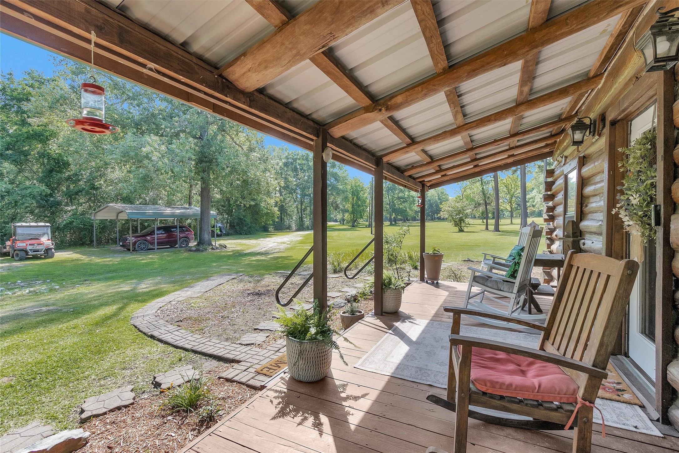 1356 Pegoda Ranch Road Groveton, TX 75845 - Photo 8 of 44 a view of an outdoor sitting area with furniture