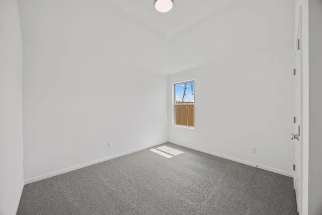 a bathroom with a shower and a bath tub