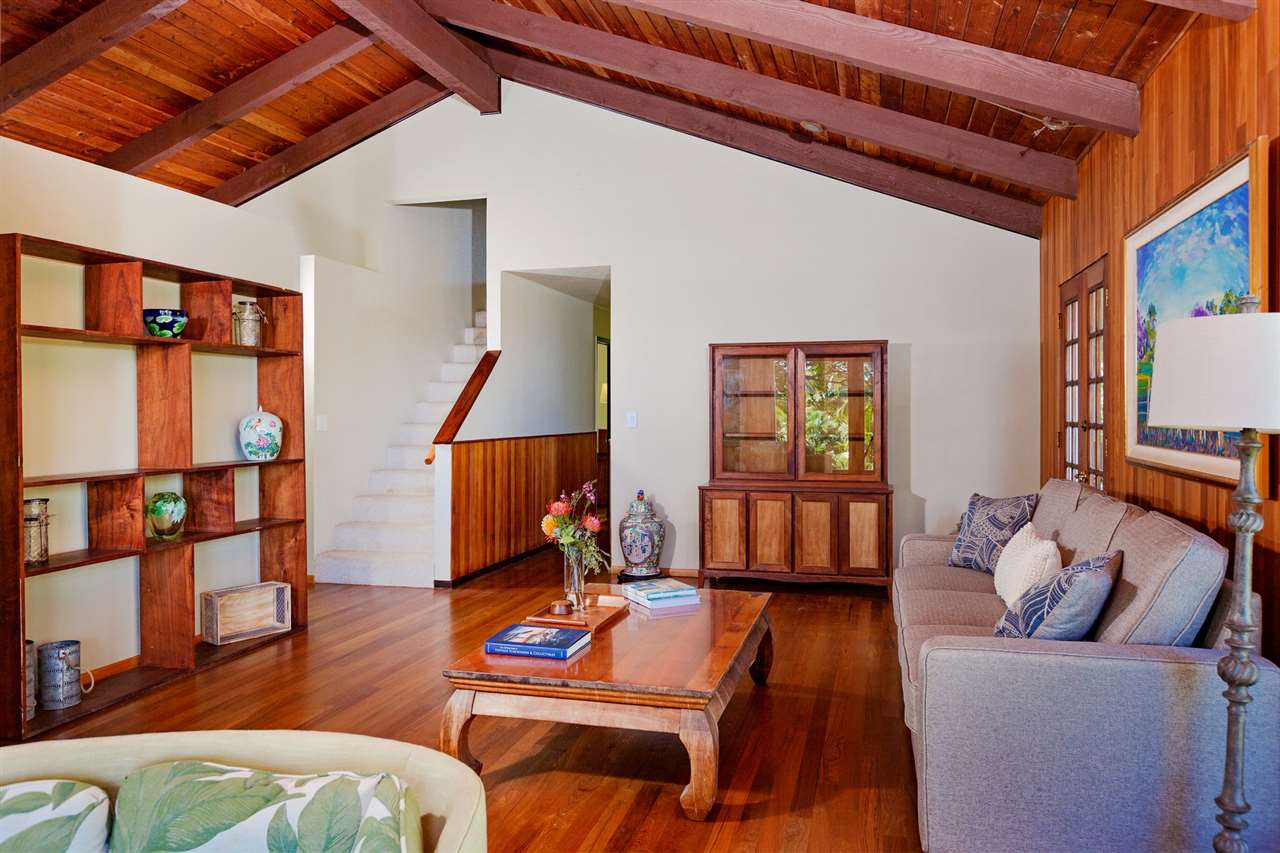 245 North Honokala Road Haiku, HI 96708 - Photo 4 of 17 a living room with furniture and wooden floor
