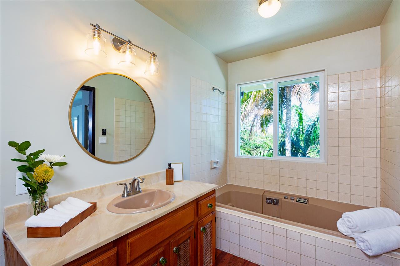 245 North Honokala Road Haiku, HI 96708 - Photo 8 of 17 a bathroom with a sink and a mirror