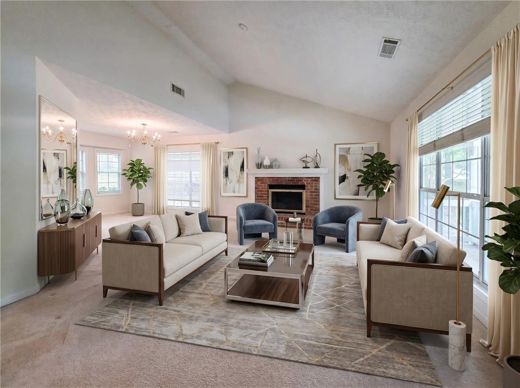 355 Austin Way Auburn, GA 30011 - Photo 3 of 19 a living room with furniture a fireplace and a large window