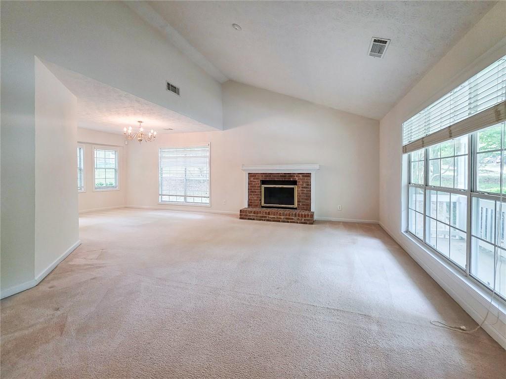 355 Austin Way Auburn, GA 30011 - Photo 4 of 19 a view of a livingroom with a fireplace