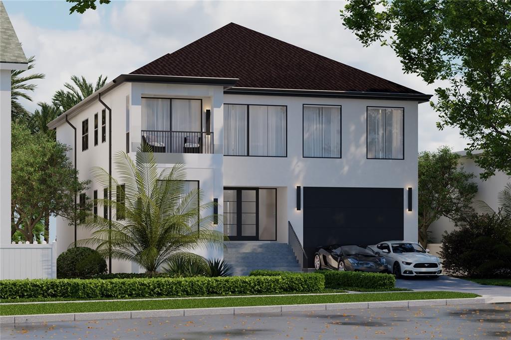 4523 West Rosemere Road Tampa, FL 33609 - Photo 1 of 9 a front view of a house with garden