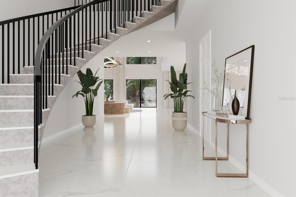 4523 West Rosemere Road Tampa, FL 33609 - Photo 4 of 9 a hallway with wooden floor stairs and a living room