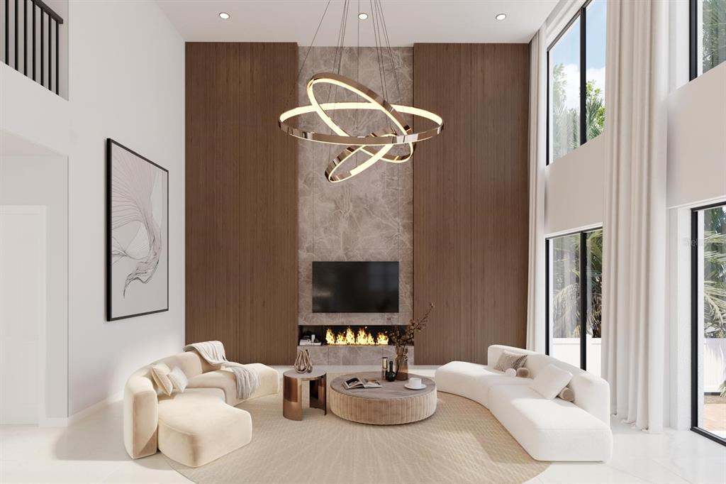 4523 West Rosemere Road Tampa, FL 33609 - Photo 5 of 9 a living room with furniture and a flat screen tv