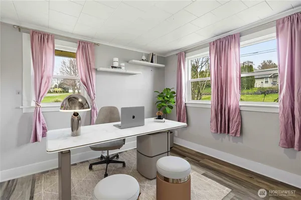 a kitchen with a table chairs and a dining table