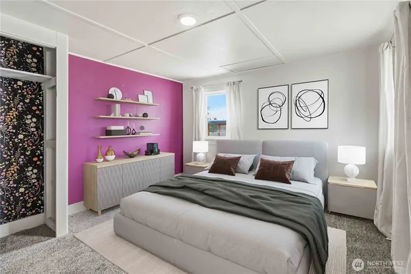 a bedroom with a bed and a window