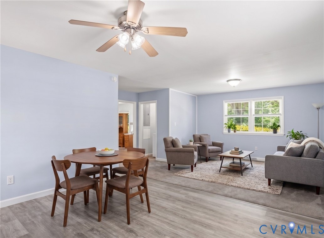 15503 Eppes Road Dewitt, VA 23840 - Photo 2 of 22 a view of a dining room with furniture window and wooden floor