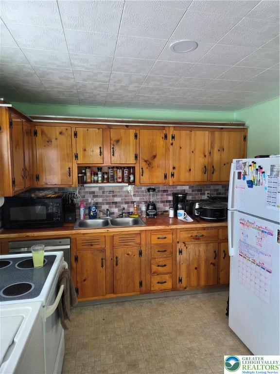 14 Magna Drive Coplay, PA 18037 - Photo 15 of 23 a kitchen with stove cabinets and a sink