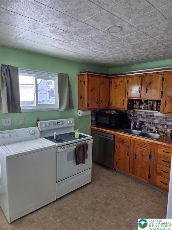14 Magna Drive Coplay, PA 18037 - Photo 16 of 23 a kitchen with stainless steel appliances a stove sink and cabinets
