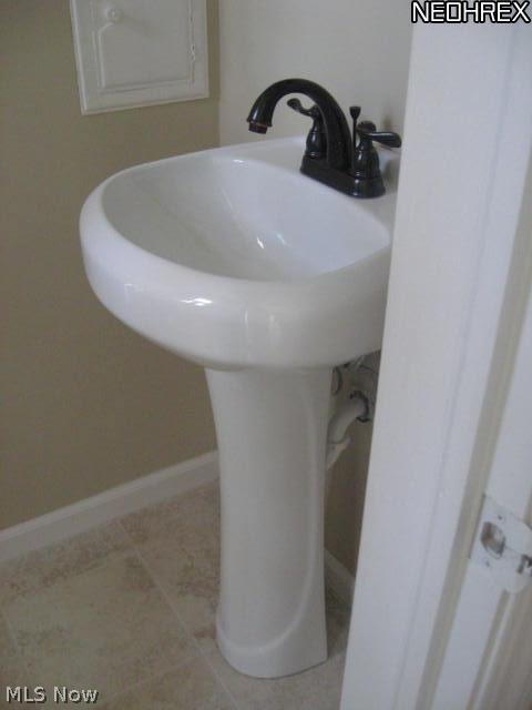 21443 Eaton Road Cleveland, OH 44126 - Photo 8 of 19 Half bath located off the kitchen, totally redone.