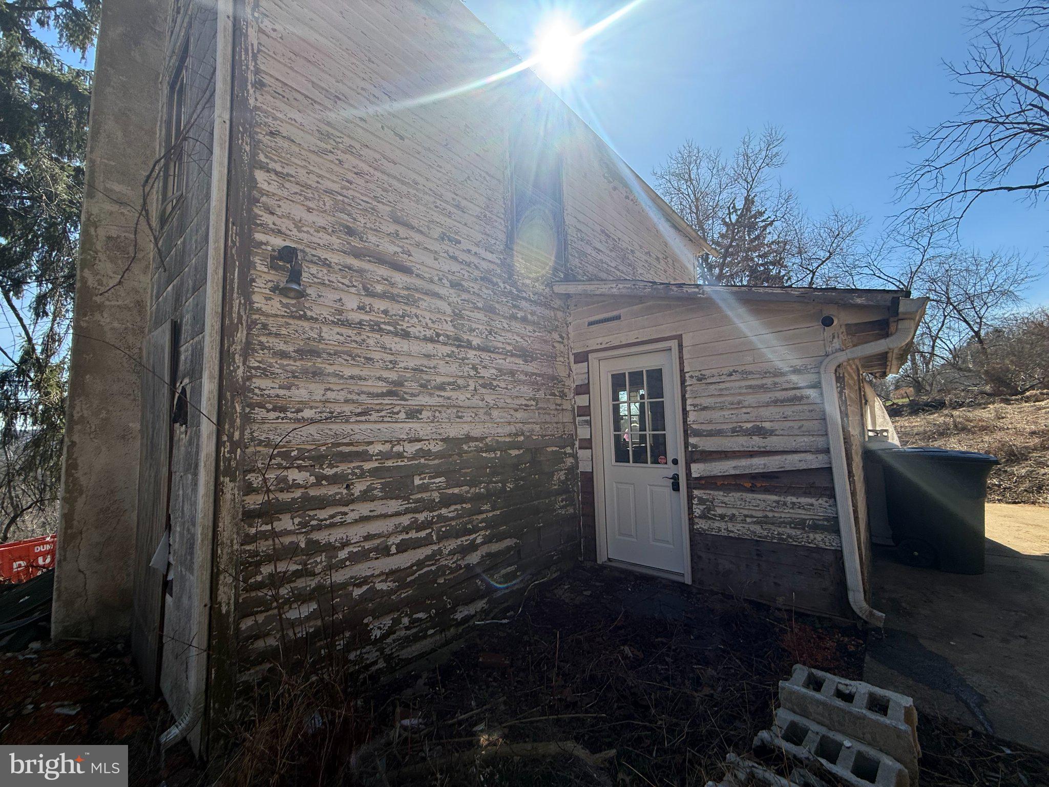 1229 Seidersville Road Bethlehem, PA 18015 - Photo 7 of 9 Charming rustic home with sunlit facade.
