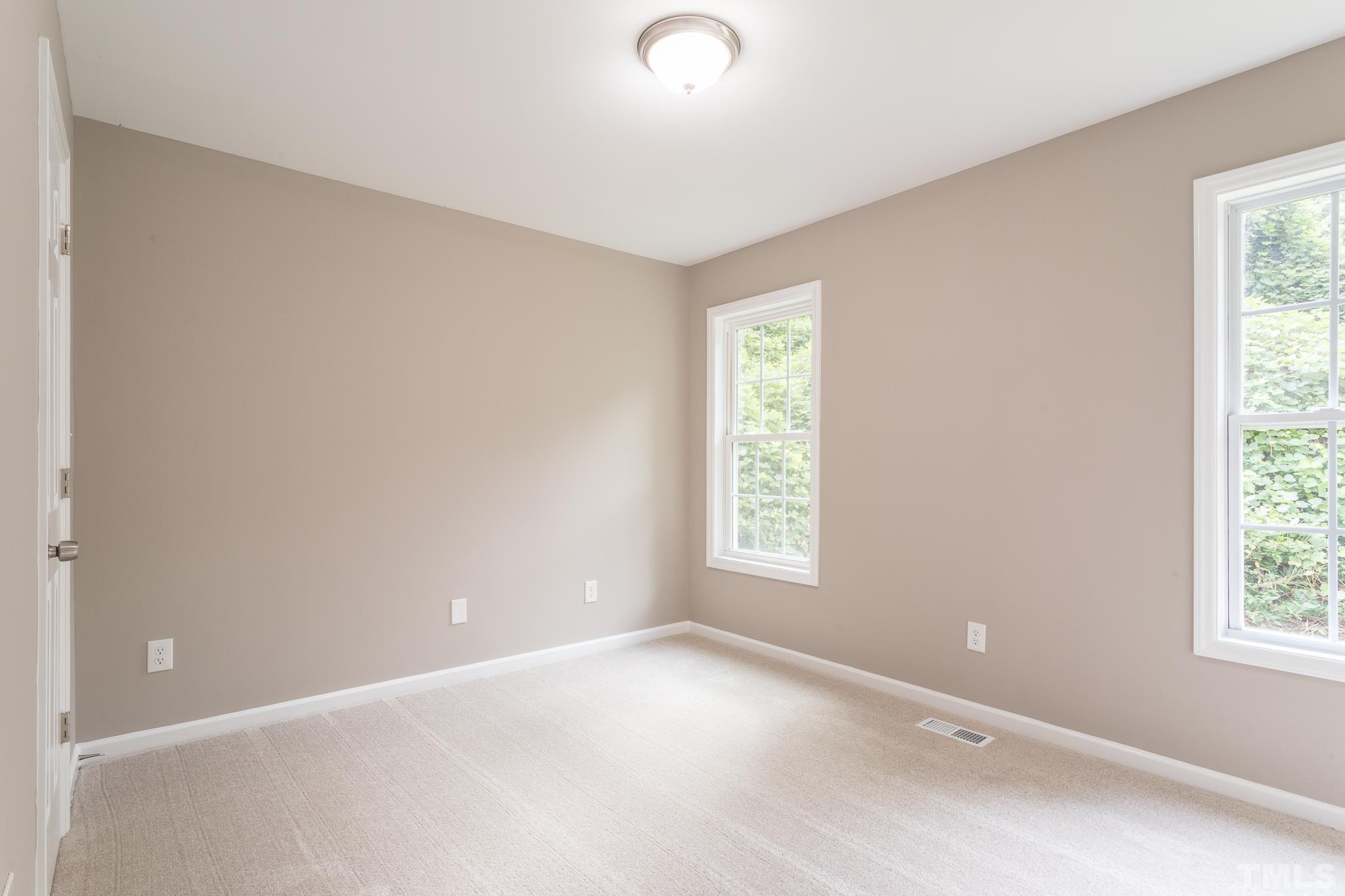 1807 South Roxboro Street Durham, NC 27707 - Photo 15 of 27 an empty room with windows