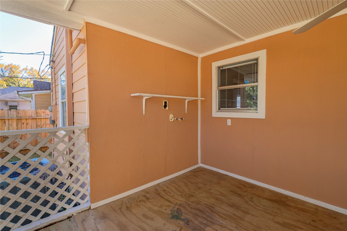 715 Center Street Pasadena, TX 77506 - Photo 26 of 33 a view of a hallway with wooden floor and a window