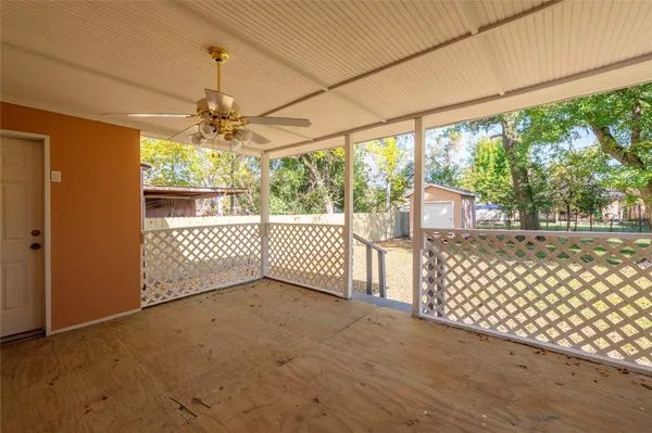 a front view of house with yard outdoor seating and barbeque oven