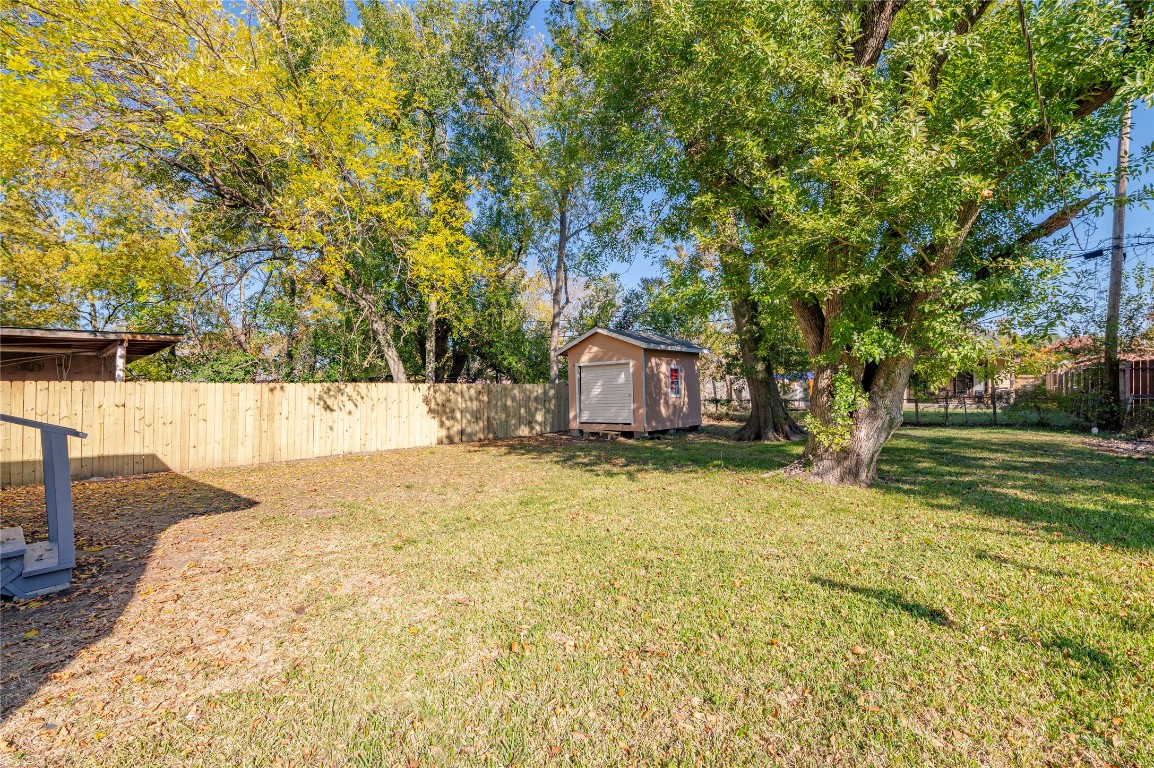 715 Center Street Pasadena, TX 77506 - Photo 30 of 33 a view of a yard with a tree
