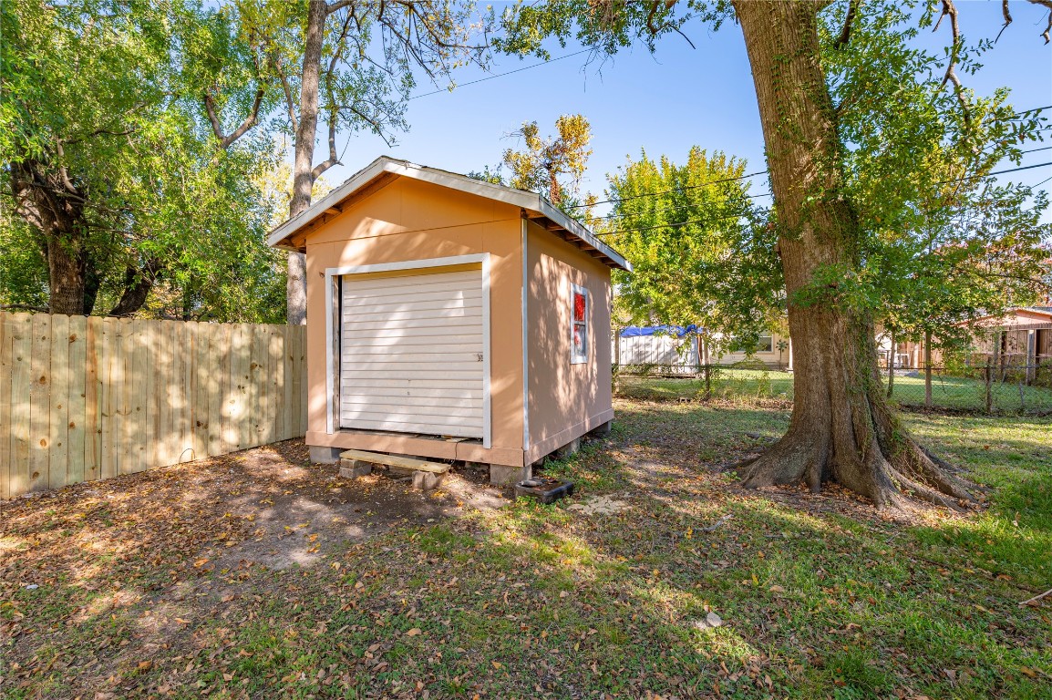 715 Center Street Pasadena, TX 77506 - Photo 31 of 33 a view of a house with a yard and tree
