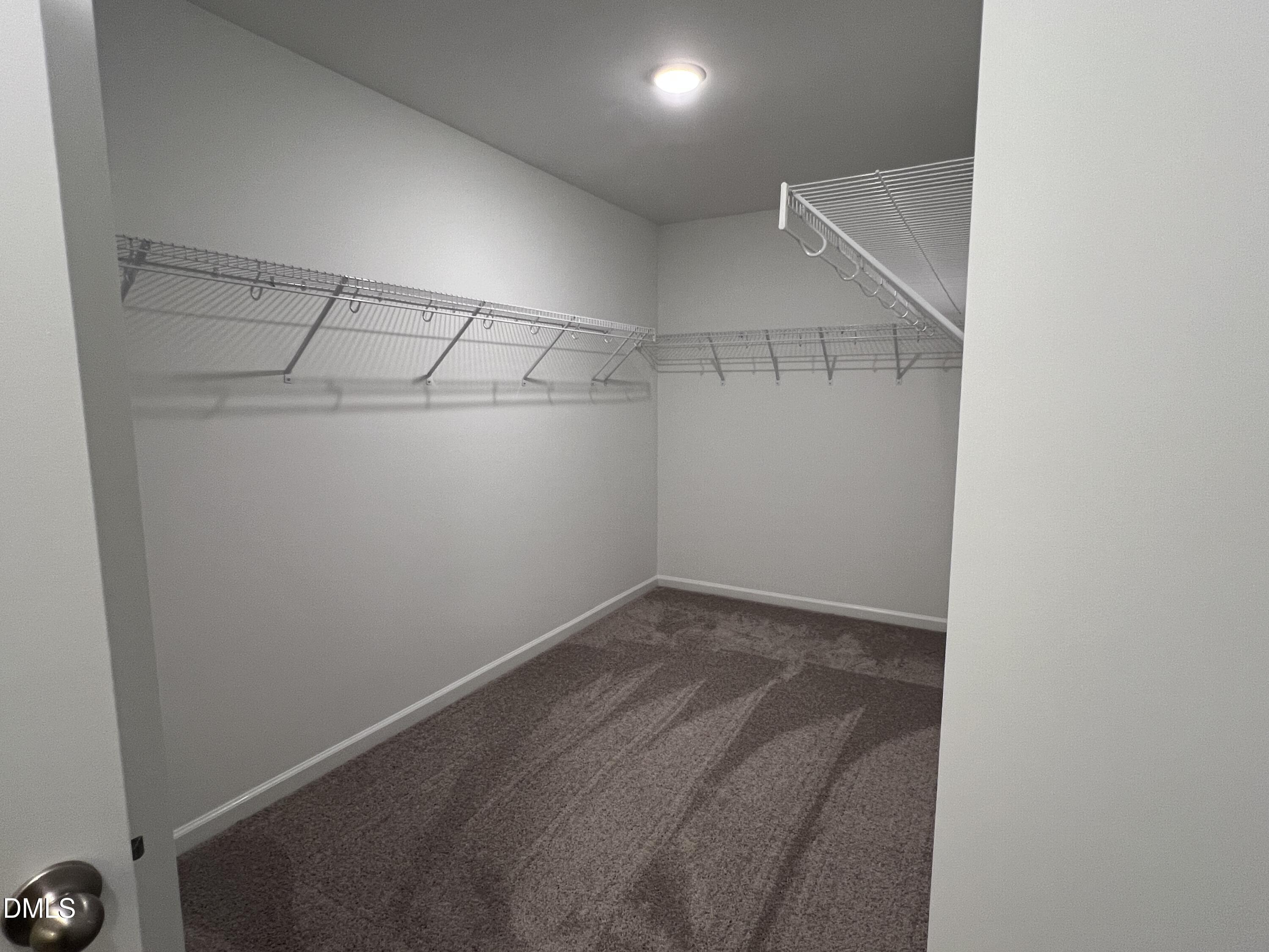 2017 Regal Drive Durham, NC 27703 - Photo 14 of 28 a view of a room with racks on the wall