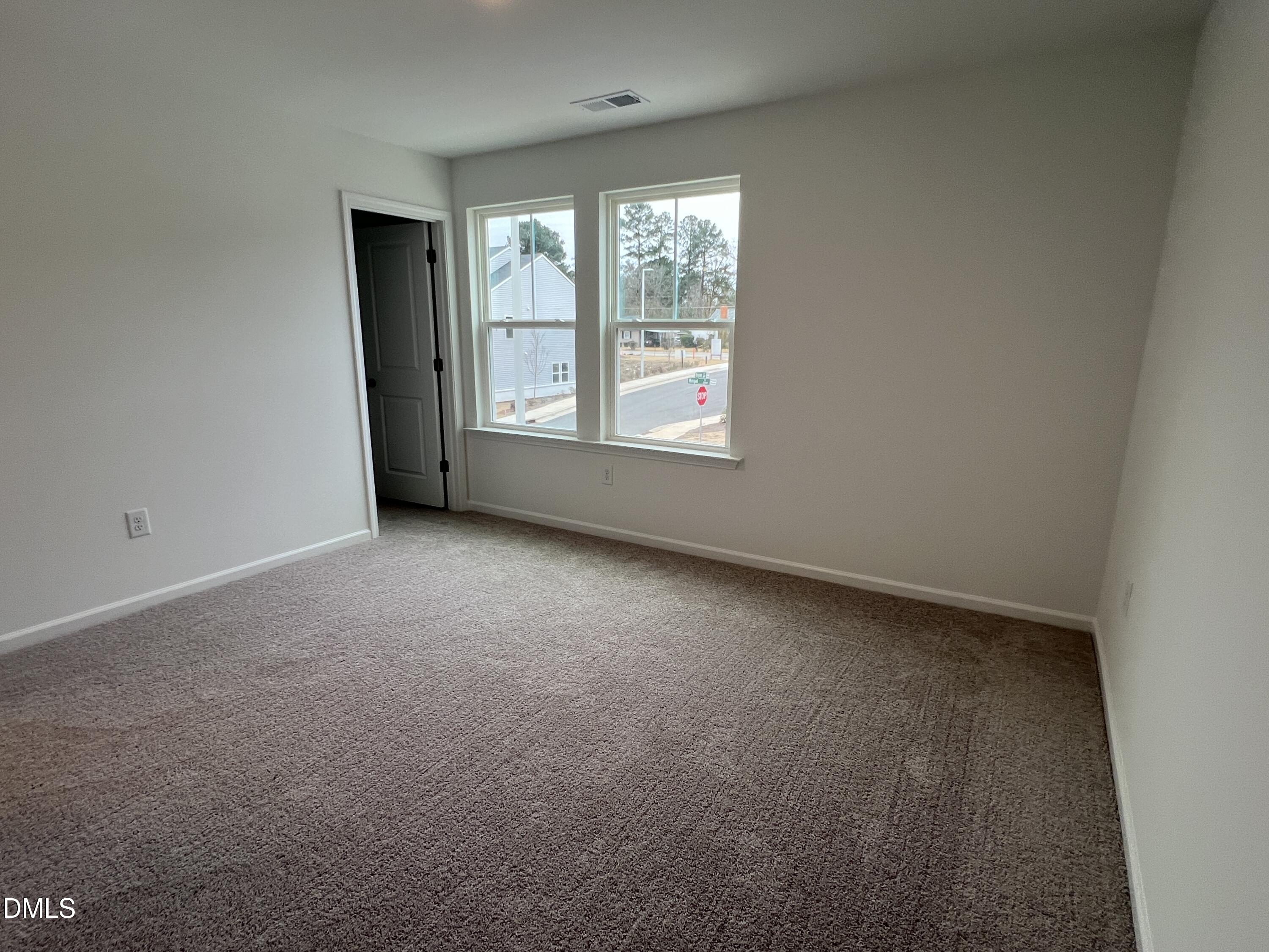 2017 Regal Drive Durham, NC 27703 - Photo 17 of 28 an empty room with windows