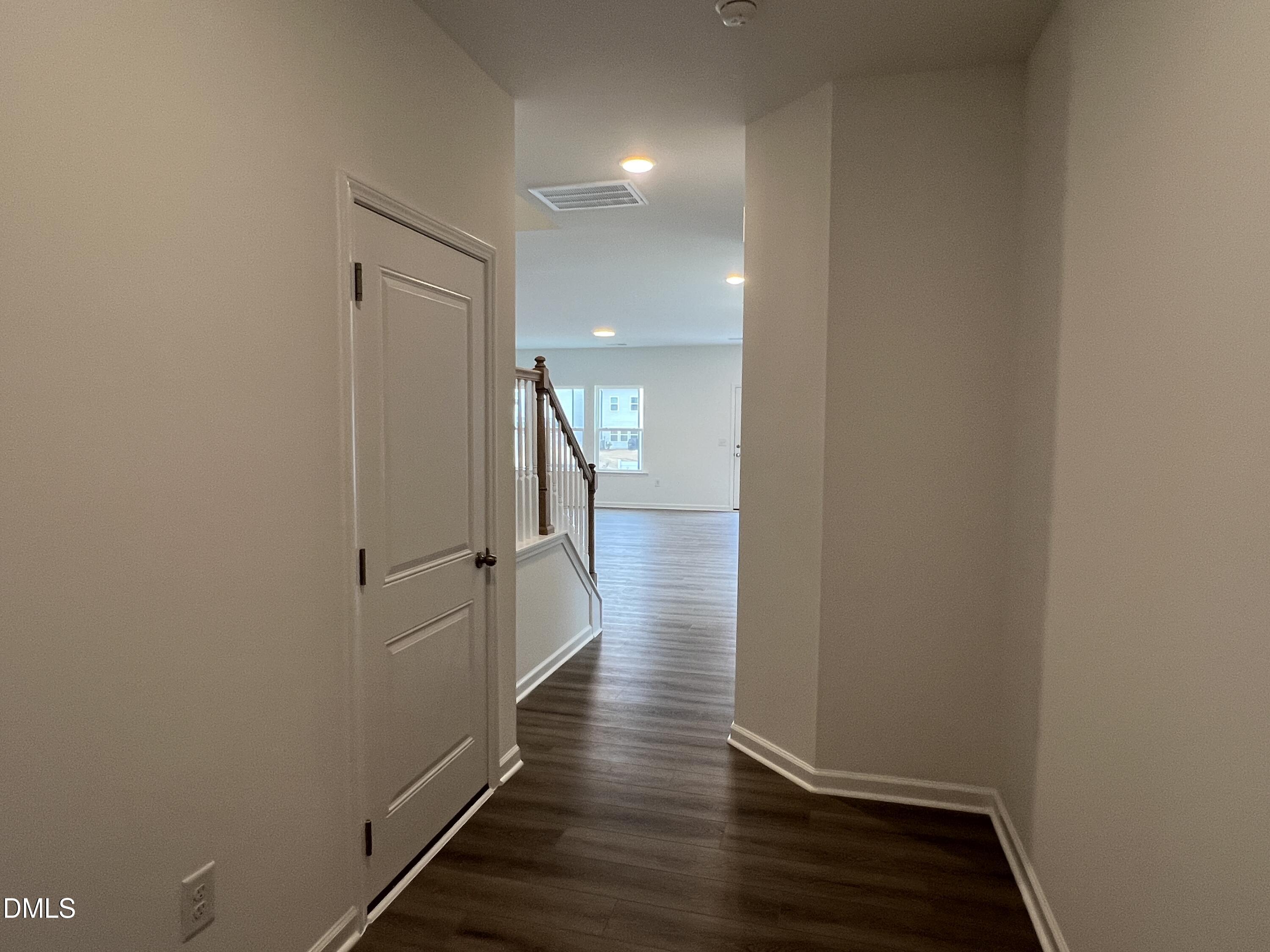 2017 Regal Drive Durham, NC 27703 - Photo 3 of 28 a view of a hallway with wooden floor