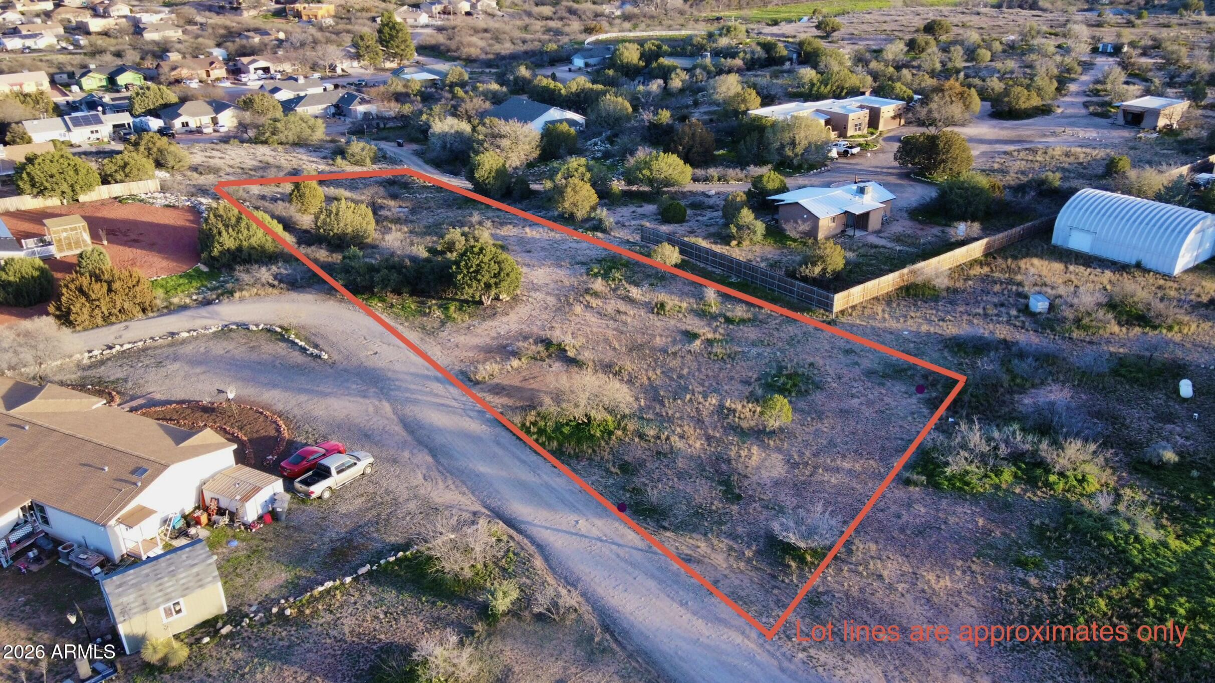 an aerial view of a house with a garden