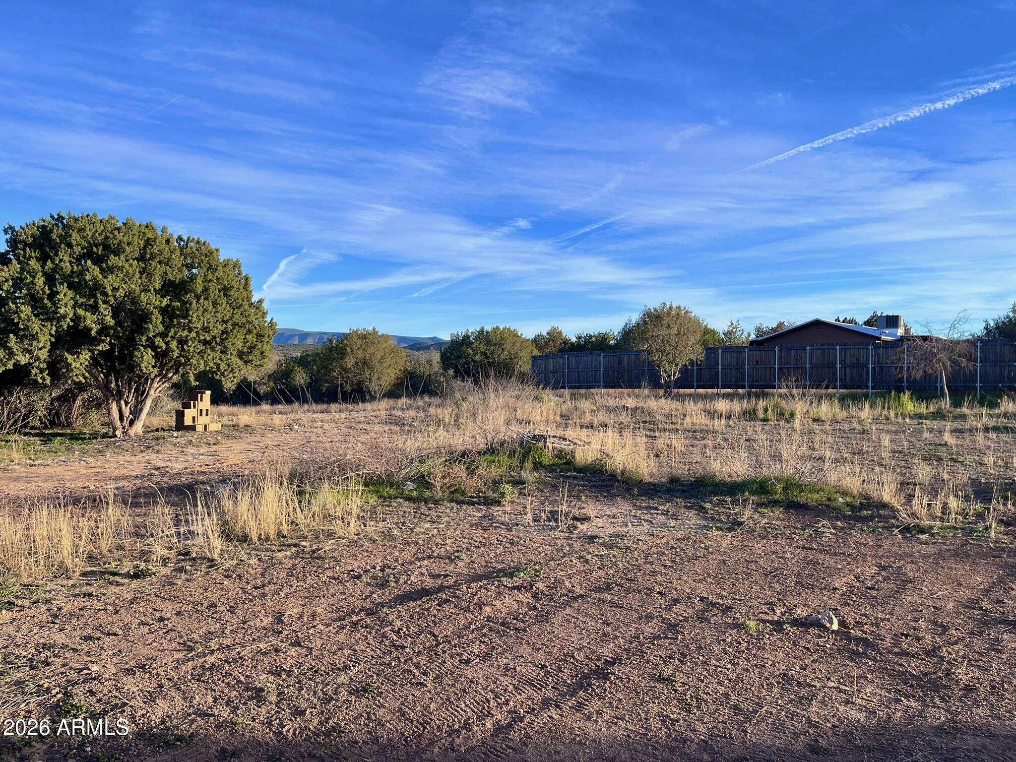 5625 North Robin Lynn Lane Rimrock, AZ 86335 - Photo 14 of 24 a view of a yard with wooden fence