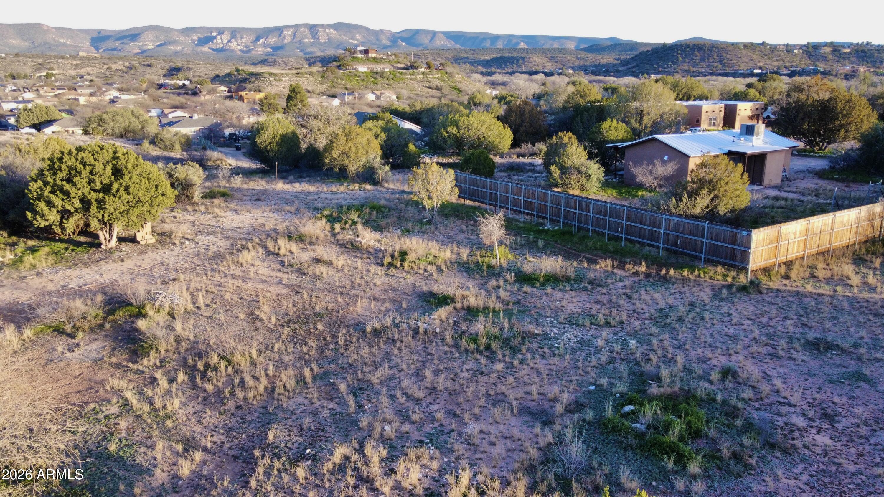 5625 North Robin Lynn Lane Rimrock, AZ 86335 - Photo 16 of 24 a view of a lake with mountains in the background
