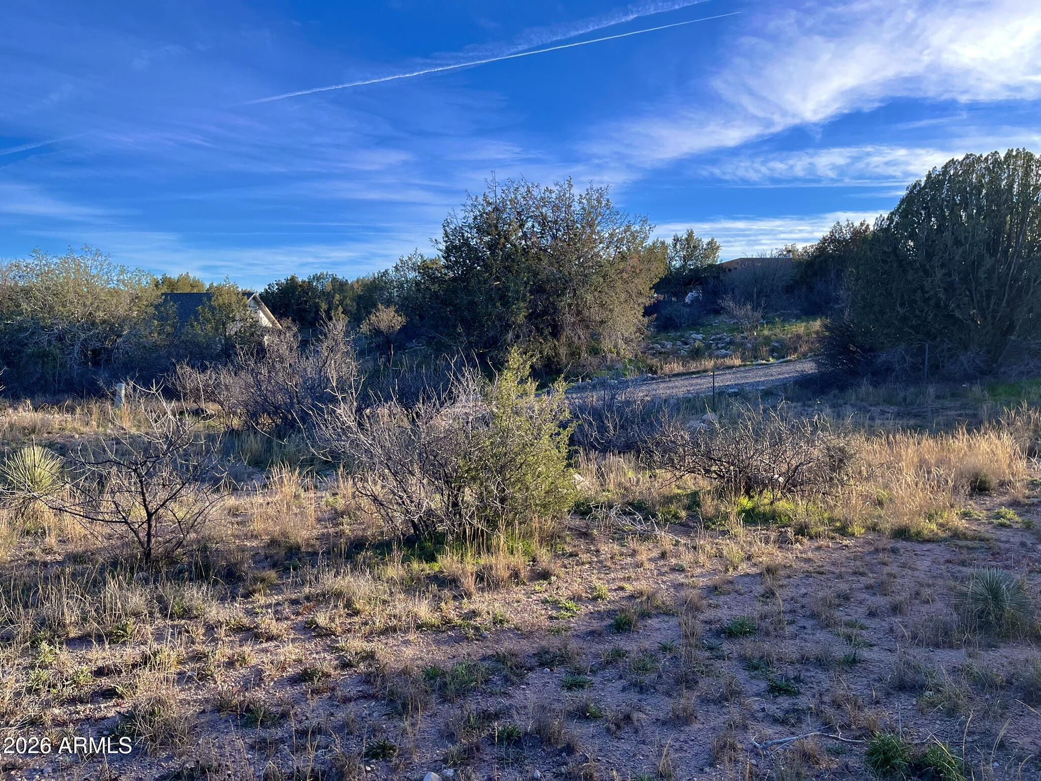 5625 North Robin Lynn Lane Rimrock, AZ 86335 - Photo 19 of 24 a view of a lake with a mountain in the background