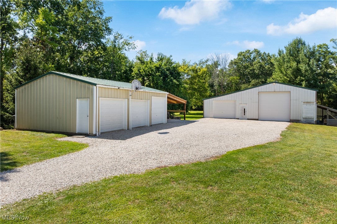 10229 Crawford Road Homerville, OH 44235 - Photo 34 of 42 Garage with a garage