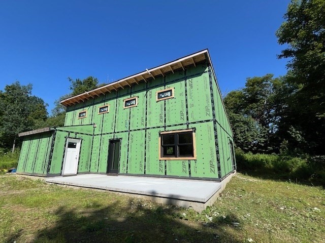 961 Peru Road Windsor, MA 01270 - Photo 2 of 23 a front view of a house with garden