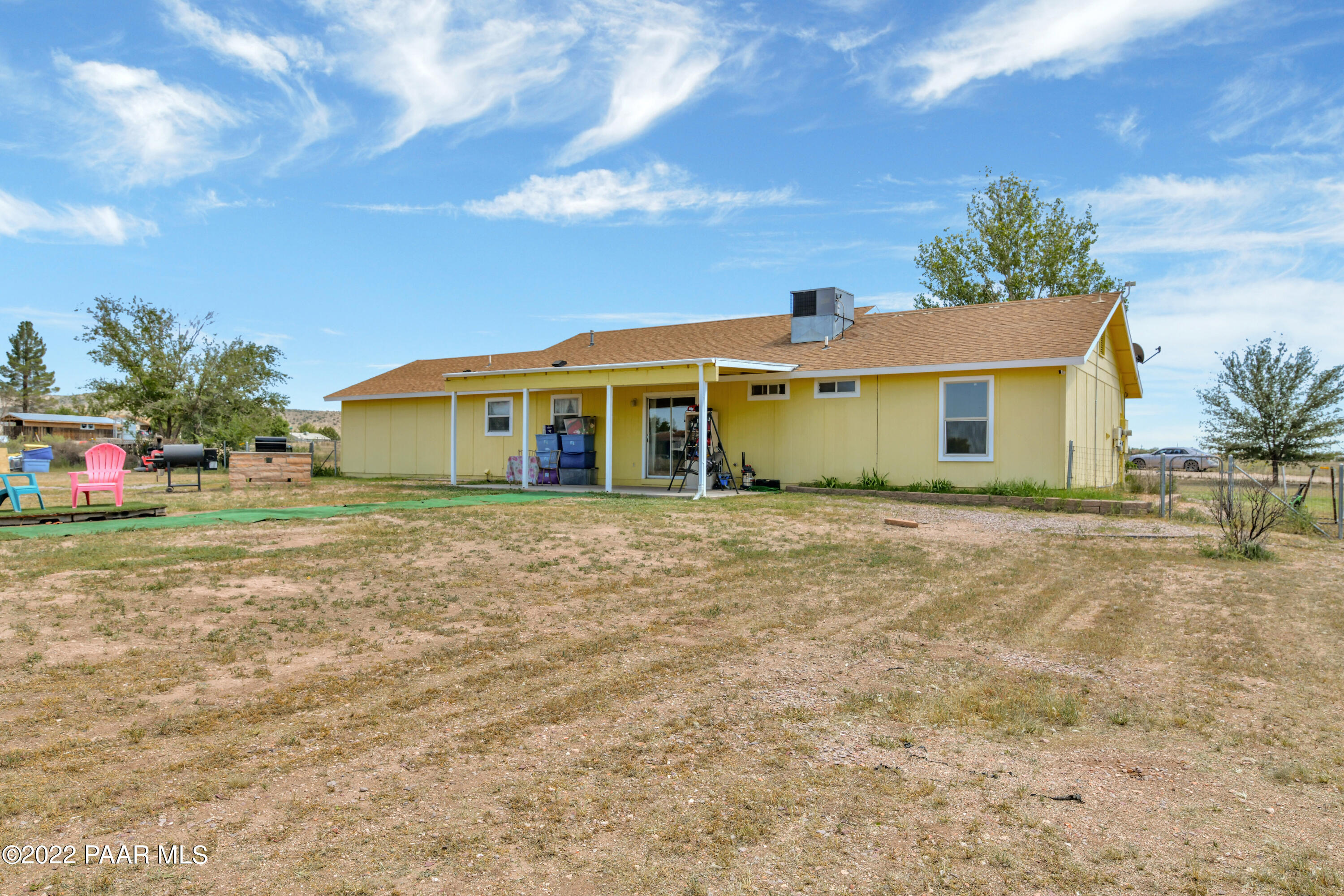 25820 Poppy Road Paulden, AZ 86334 - Photo 27 of 28 a front view of a house with a garden