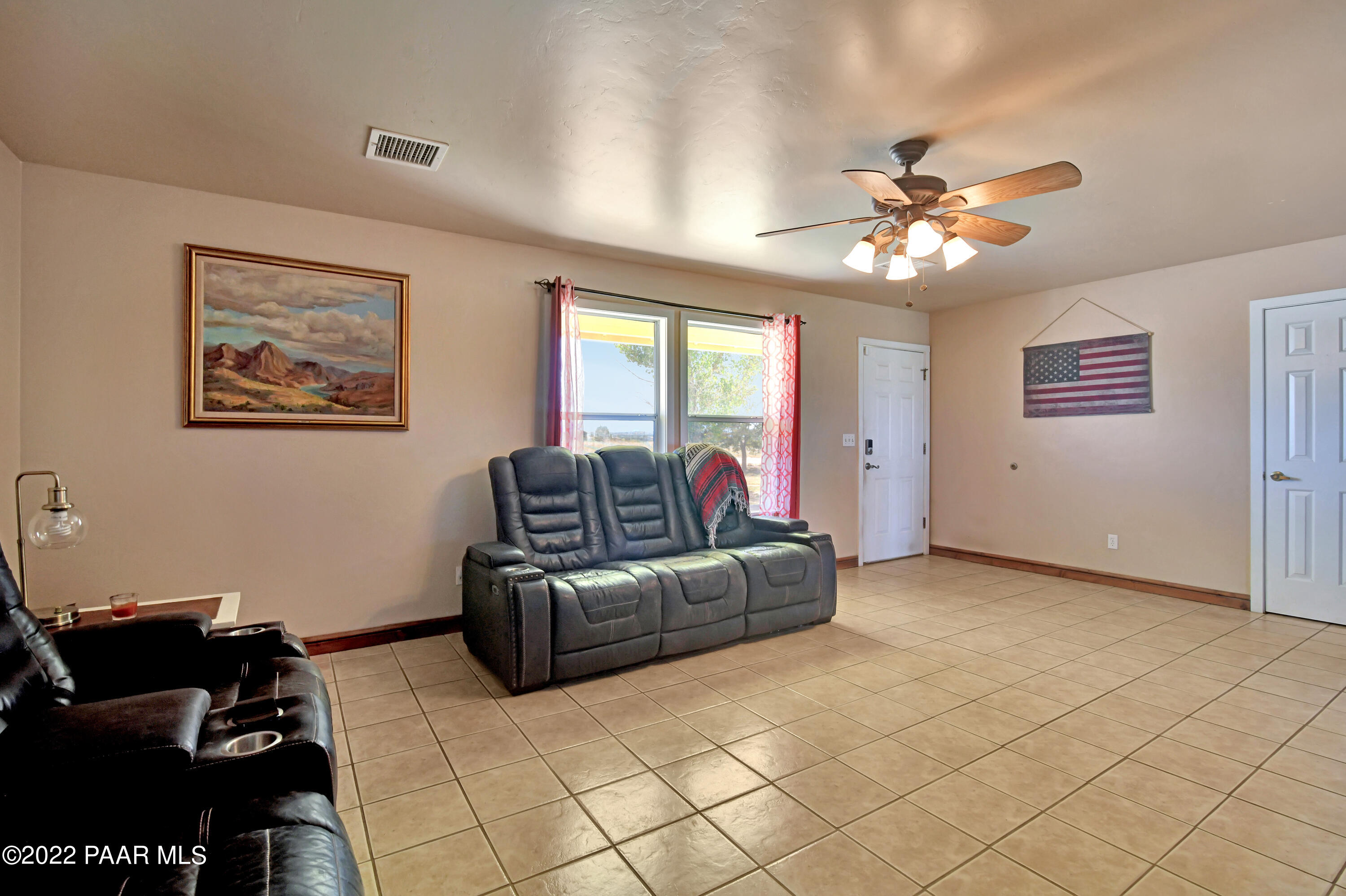 25820 Poppy Road Paulden, AZ 86334 - Photo 10 of 28 a living room with furniture and a window