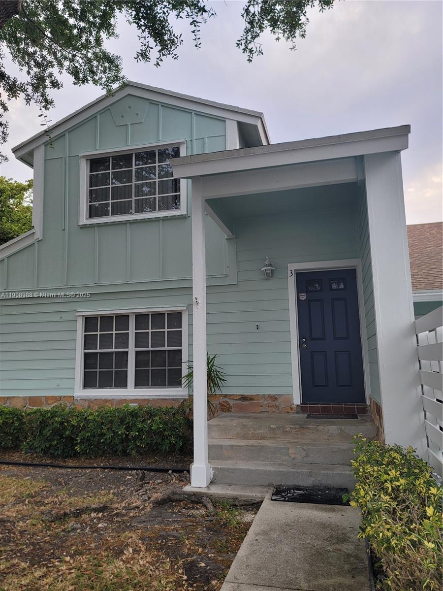 13792 Southwest 149th Cir Lane, Unit 3 Miami, FL 33186 - Photo 1 of 7 a front view of a house