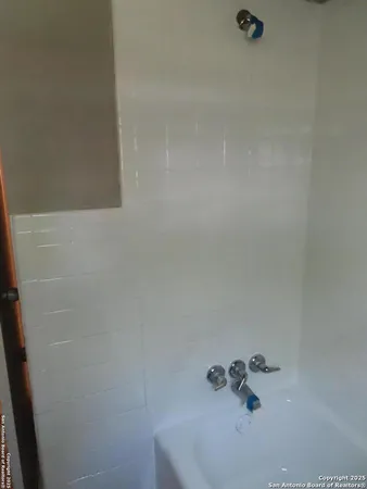 a bathroom with a bathtub