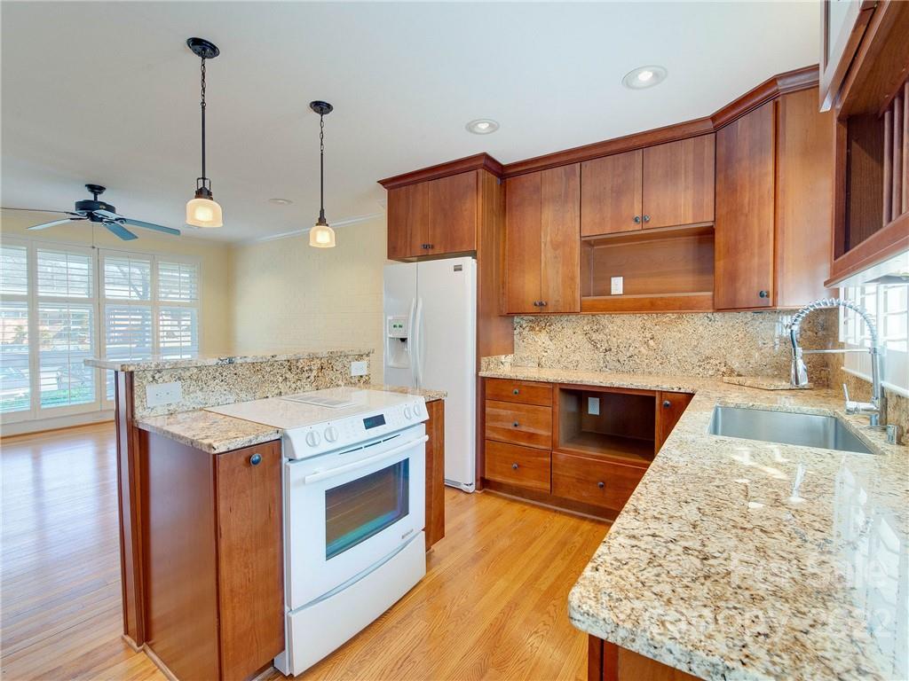 1007 Andover Road, Unit A3 Charlotte, NC 28211 - Photo 15 of 38 a kitchen with a stove and a sink