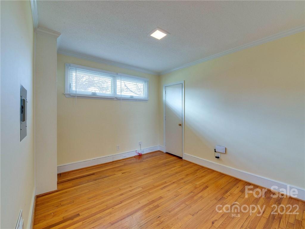 1007 Andover Road, Unit A3 Charlotte, NC 28211 - Photo 20 of 38 a view of empty room with wooden floor