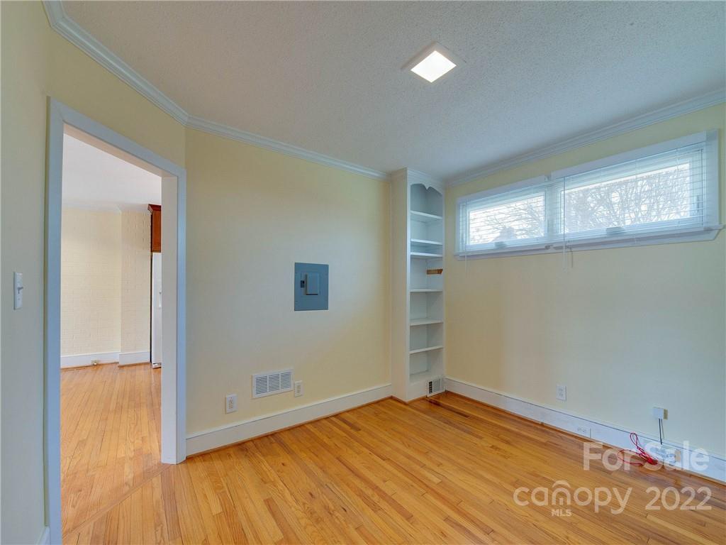 1007 Andover Road, Unit A3 Charlotte, NC 28211 - Photo 21 of 38 a view of empty room with wooden floor
