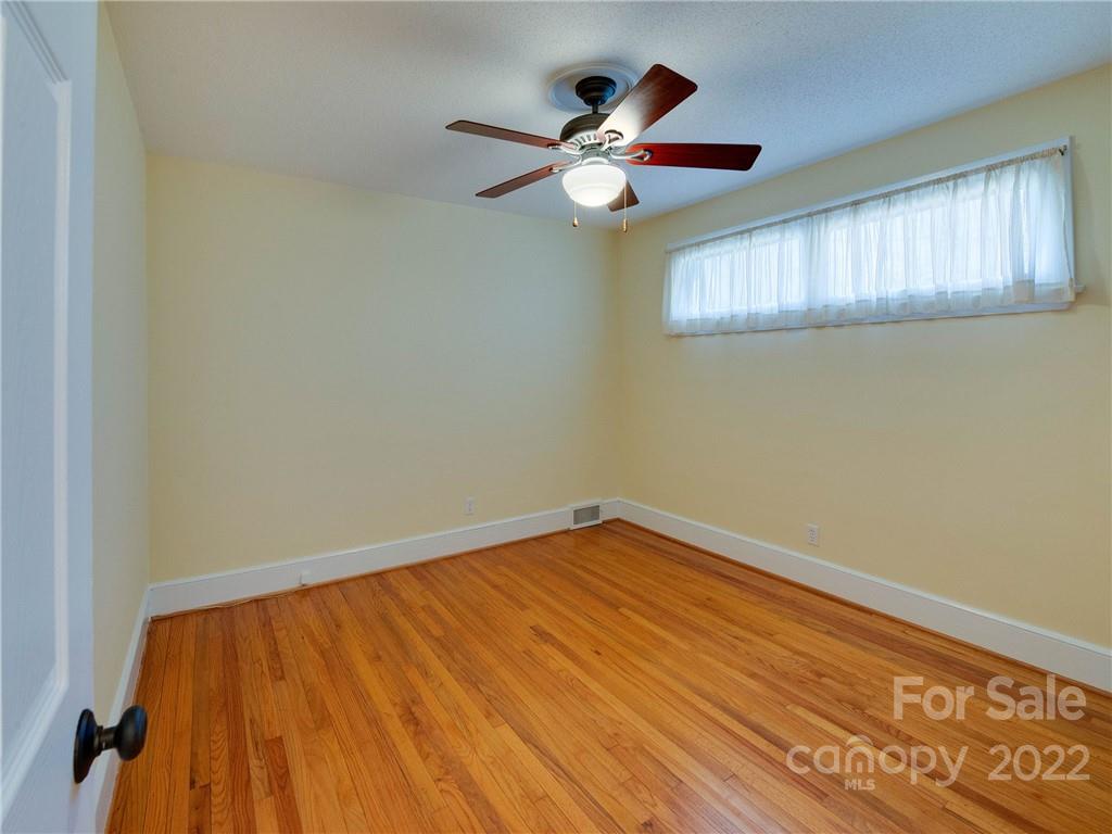 1007 Andover Road, Unit A3 Charlotte, NC 28211 - Photo 25 of 38 wooden floor in an empty room