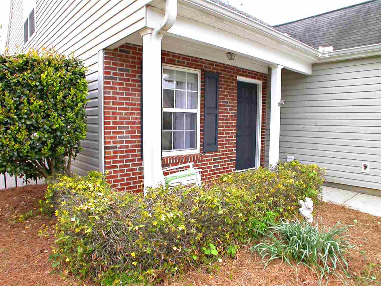 11036 Feather Grass Lane Raleigh, NC 27613 - Photo 23 of 25 A real Rocking Chair Front Porch. HOA does landscape maintenance for all front yards (not back or side yard) Front Porch