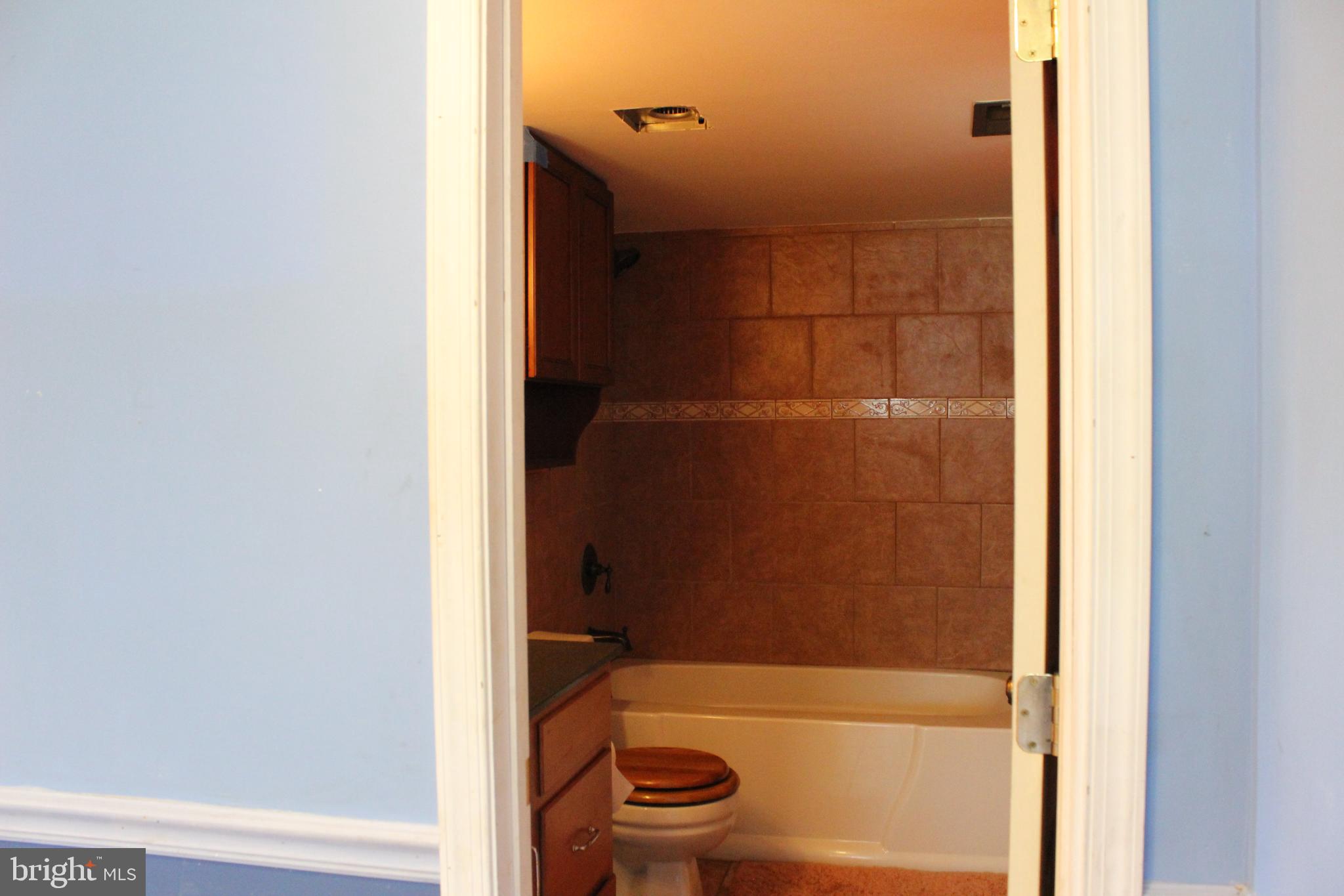 418 Florida Avenue Herndon, VA 20170 - Photo 14 of 14 a bathroom with a shower