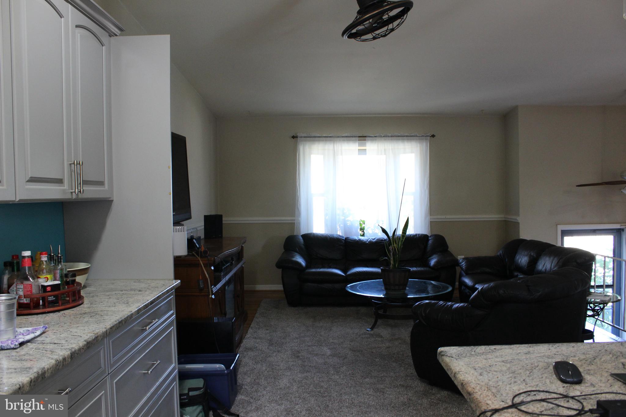 418 Florida Avenue Herndon, VA 20170 - Photo 5 of 14 a living room with furniture and a window