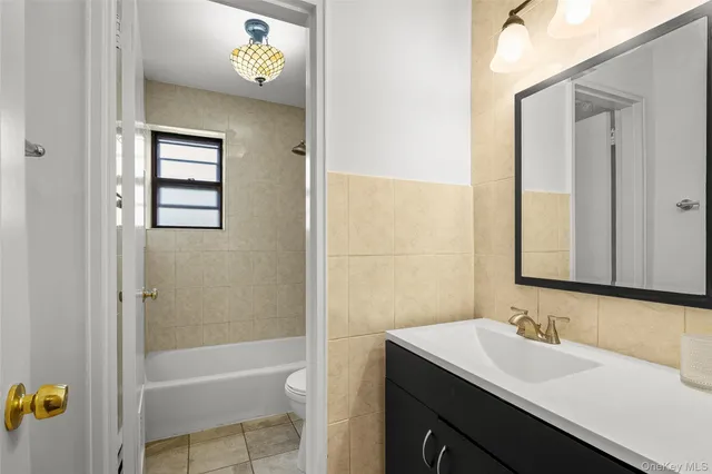 a bathroom with a sink and a bathtub