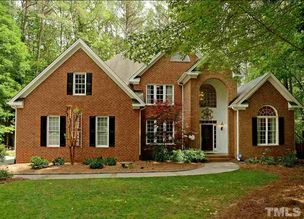 Executive Custom Home with brick front and beautiful well established landscaping!  Updated irrigation system!