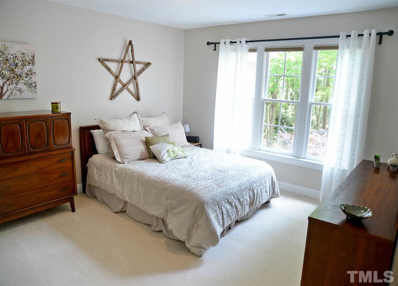 5800 Stone Canyon Court Raleigh, NC 27613 - Photo 15 of 30 One of the three bedrooms located on the second floor. Perfect location with bonus room nearby.