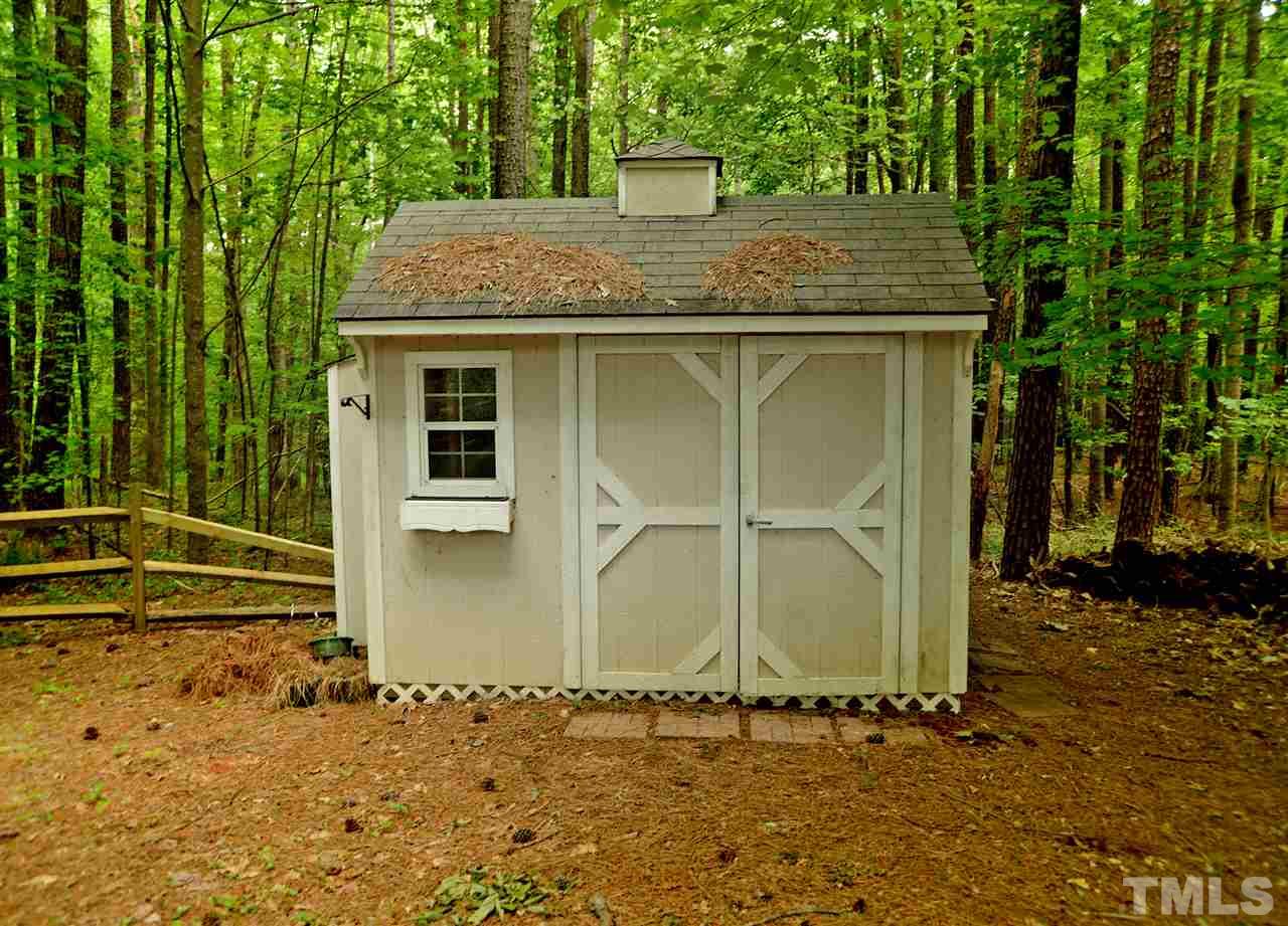 5800 Stone Canyon Court Raleigh, NC 27613 - Photo 25 of 30 Cute shed offers a great space for gardening and yard tools!