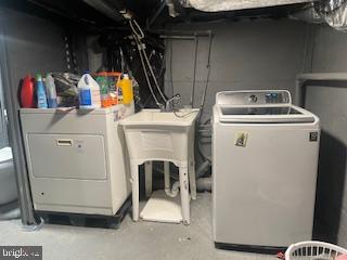 4220 Hamilton Avenue Baltimore, MD 21206 - Photo 26 of 28 a view of storage and utility room with washer and dryer