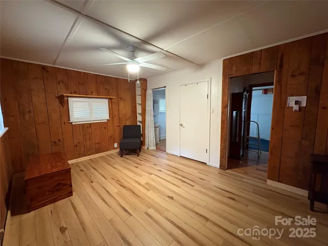 a kitchen with stainless steel appliances granite countertop a refrigerator a stove and a sink